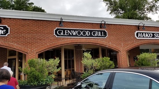 Restaurant sign on a brick building